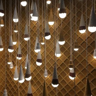 Wall of hanging ice cream cone lights Photo: Molly Doomchin