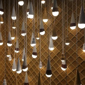 Wall of hanging ice cream cone lights Photo: Molly Doomchin