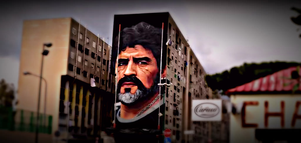Il Murales dedicato a Maradona nel quartiere San Giovanni a Teduccio a Napoli dell'artista Jorit (foto Ansa)