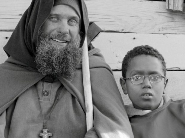 The missionary and the child (Ph. Giacomo Palermo)