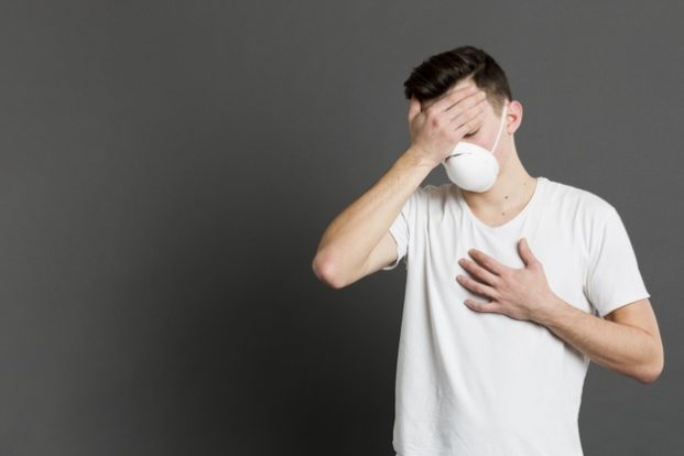 ront-view-sick-man-presenting-coronavirus-symptoms_23-2148445139