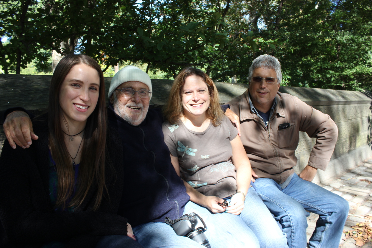 Sarah, Marty, Susan, and Tim (left to right). Marty: “They’re from New York but I live in Florida. Twenty years ago I saw the parade and now I come back every year. It’s relevant to me because I used to sell balloons and Italian feast eggs at parades when Susan, my daughter, was a baby so now I invite my daughter and granddaughter to come with me.”