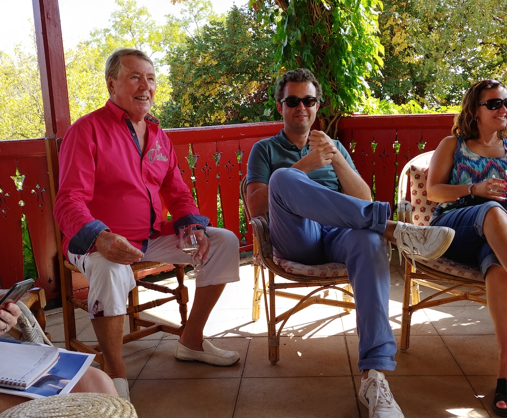 Patrick Darroze (left) Telling the Story of His Father's Passing