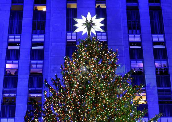 The Rockefeller Center Christmas tree stands lit during the 80th annual lighting ceremony