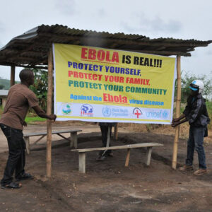 Un banner informativo in Liberia - Foto: WHO/C. Banluta