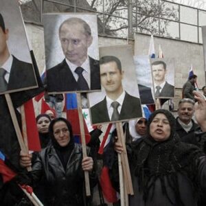 Putin va a vedere il "bluff" americano in Siria, cioè la Libia allo specchio Una delle manifestazioni pro regime di Assad davanti all'ambasciata russa a Damasco